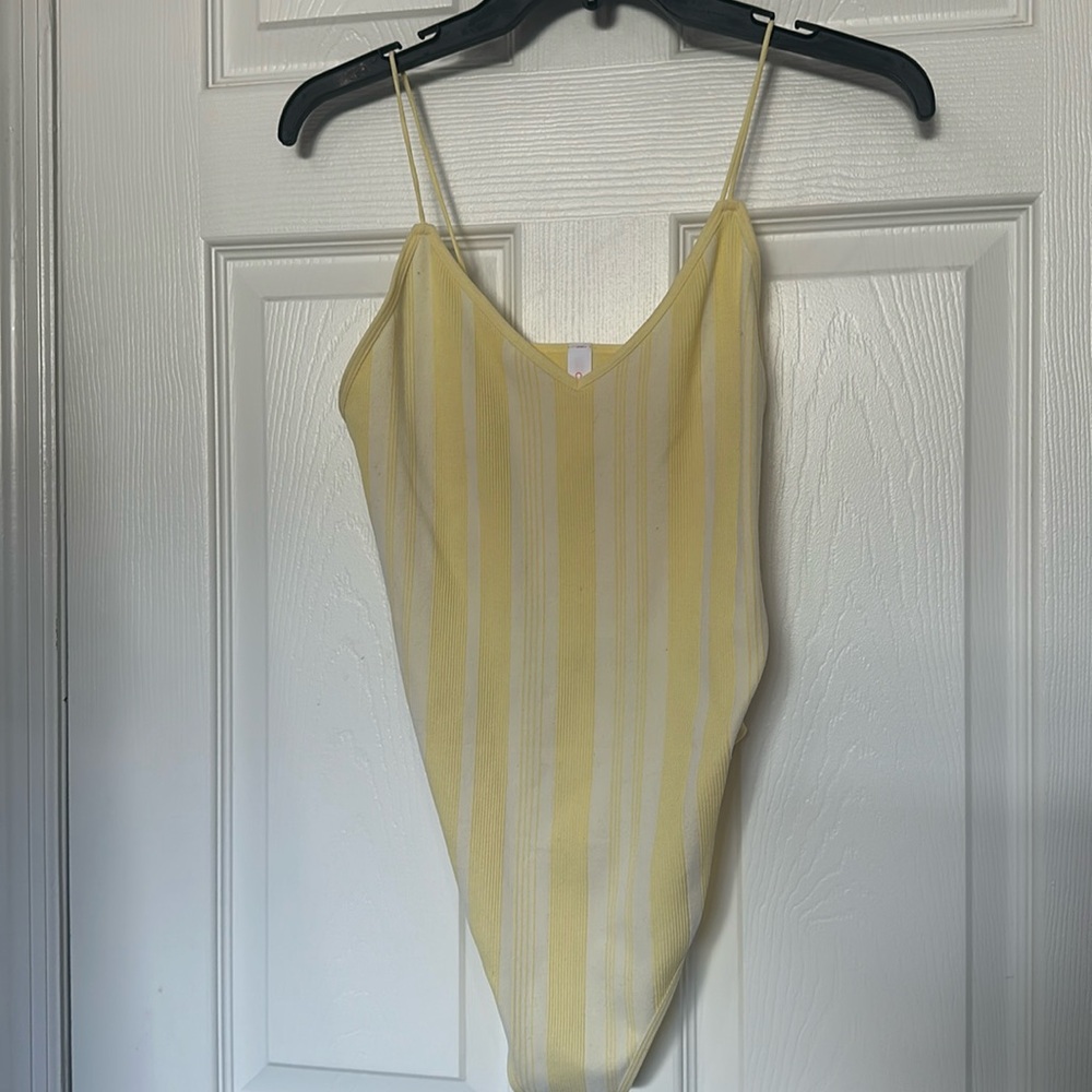 yellow and cream bodysuit
